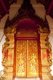 Thailand: Front doors to the viharn at Wat Phuak Hong show figures in the form of the Hindu god Vishnu, Chiang Mai